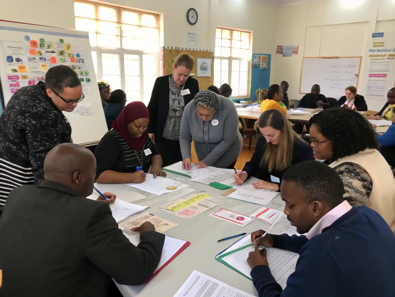 A heartwarming image showing participants of a CH'A RENTE PAR LES OREILLES training program, emphasizing the organization's commitment to professional development and community education.
